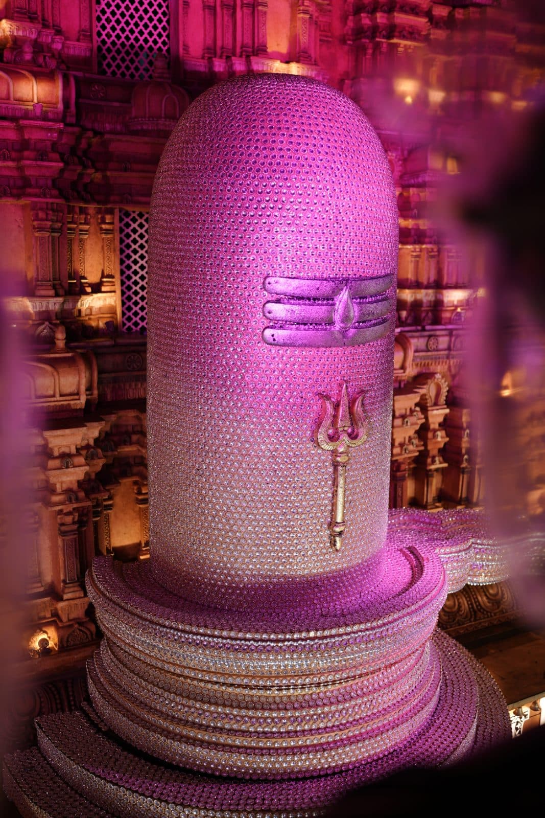 Illuminated Shivling detailed with reflective ornament