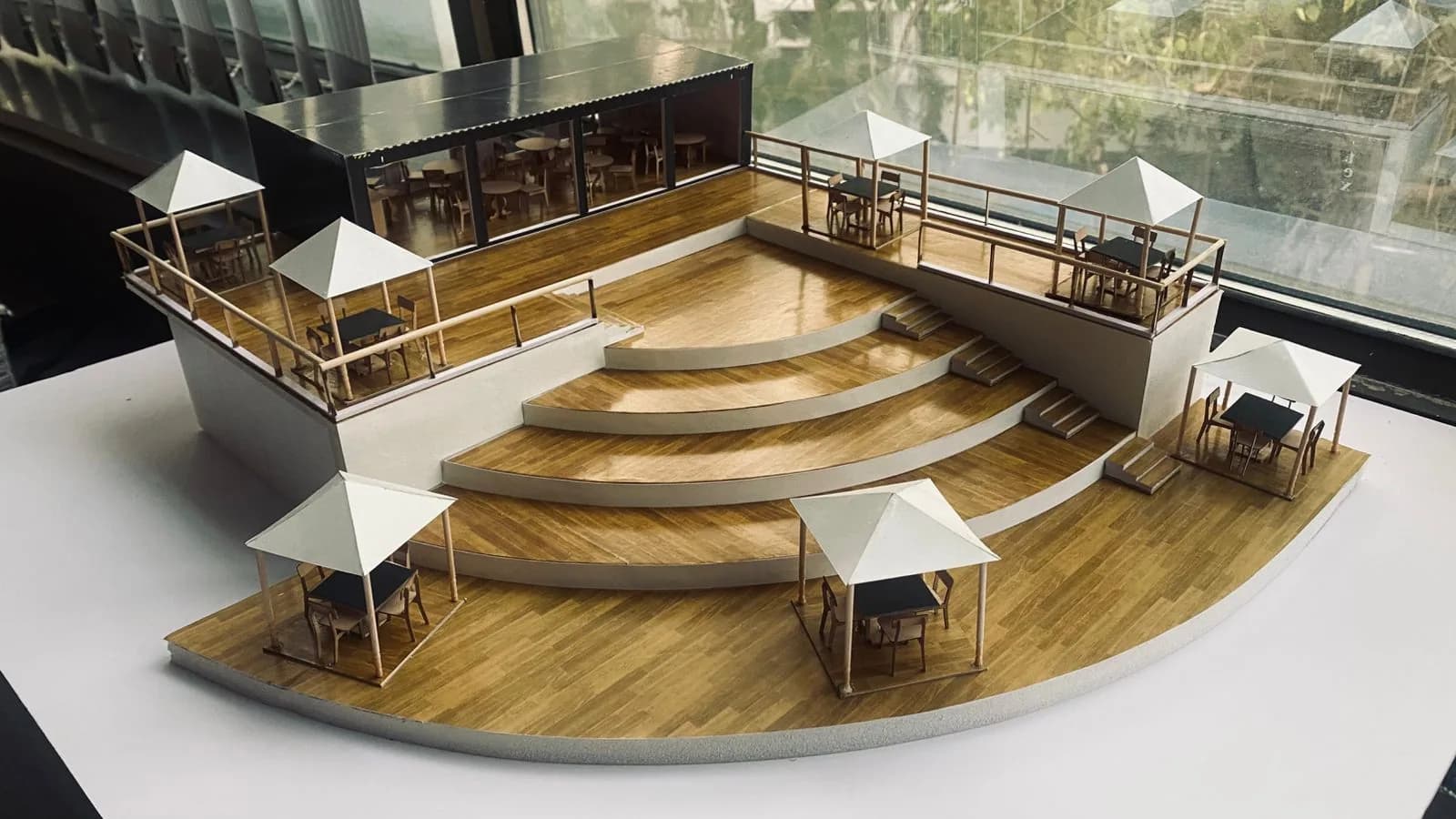 Physical model study showing the container cafe's levels and outdoor seating