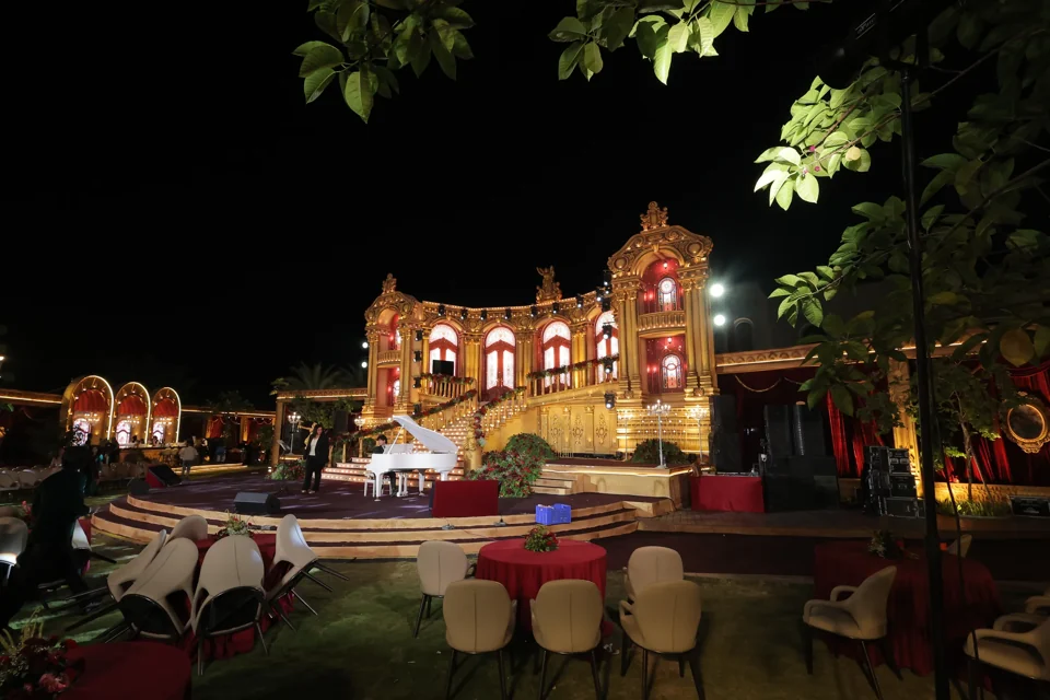 An illuminated estate transformed for an evening celebration